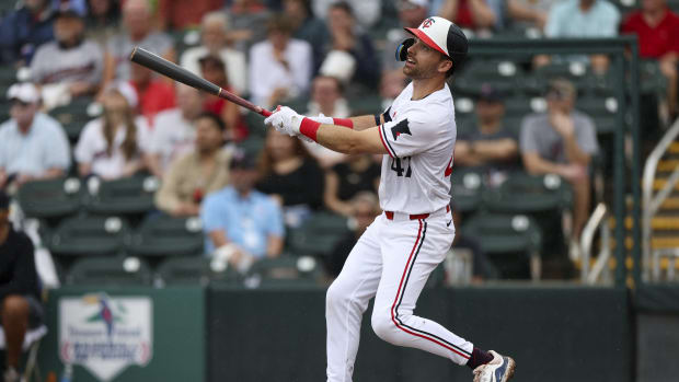 Mar 6, 2024; Fort Myers, Florida, USA; Minnesota Twins second baseman Edouard Julien (47) hits a three-run home run against the Boston Red Sox in the third inning at Hammond Stadium.